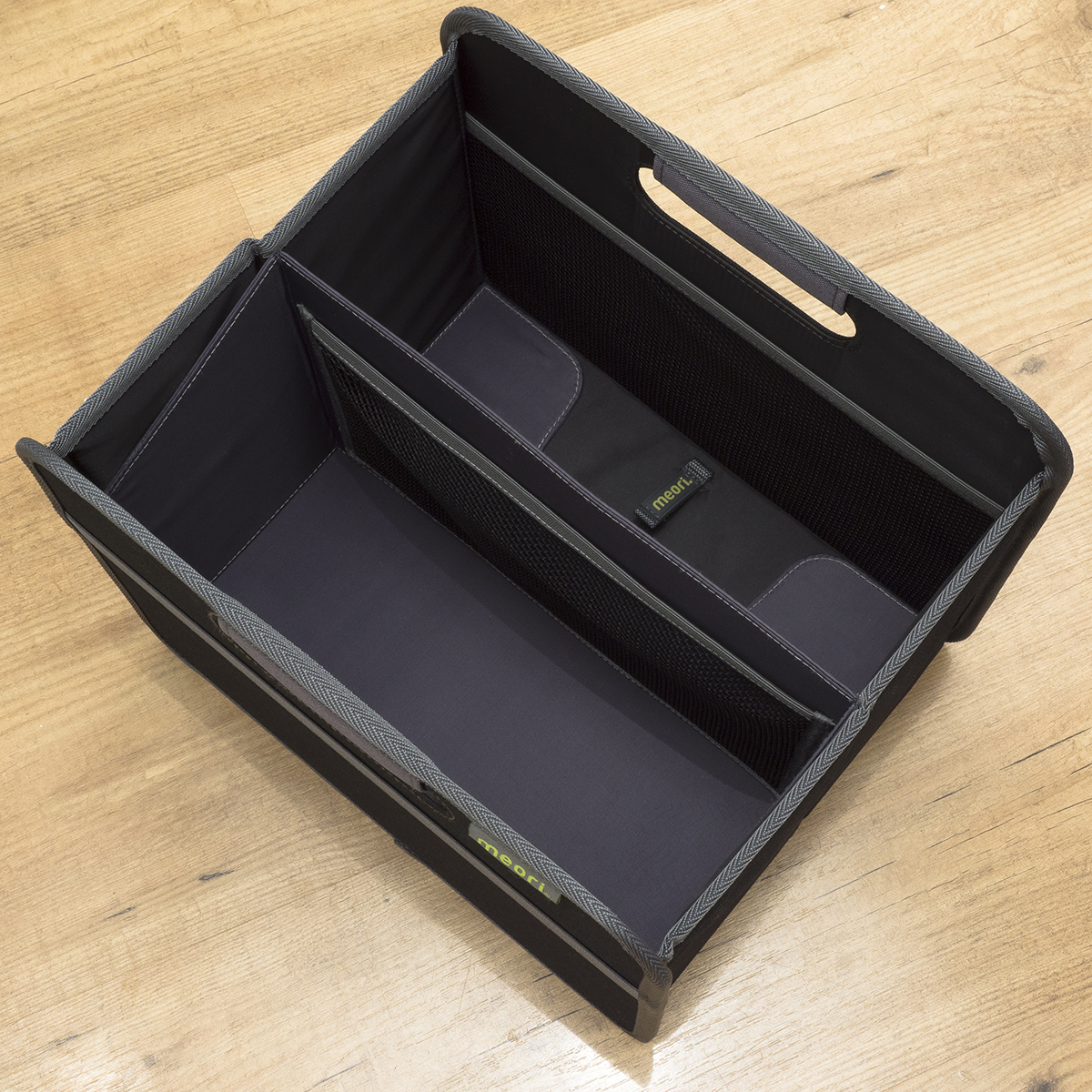 A100428-10-Accessories-meori-Magazine-Insert-S-L-LST Magazine Insert shown in small black storage cube empty