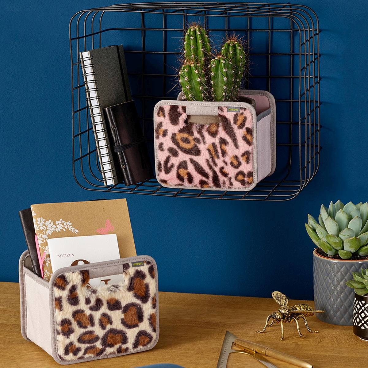 1015172-7-meori-Mini-Foldable-Box-Plush-Leopard-Sand-LST Sand-colored Collapsible Desk Organizer with Leopard Print on desk with and one mini box in shelf on wall