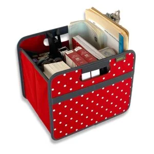Red Fabric Storage Bin with White Dots filled with office supplies