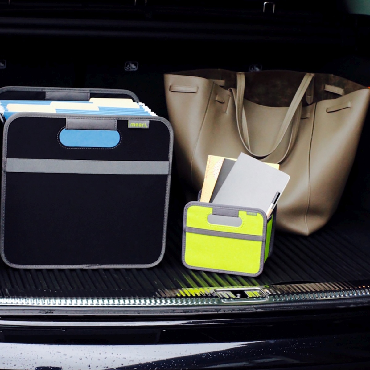 A100085-09-meori-Mini-Foldable-Box-Spring-Green-LST Green Mini Storage Box next to a hanging file box in back of trunk