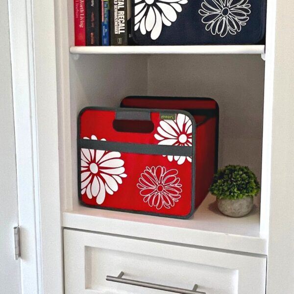 Red Small Collapsible Storage Box with Flowers Print in a book shelf