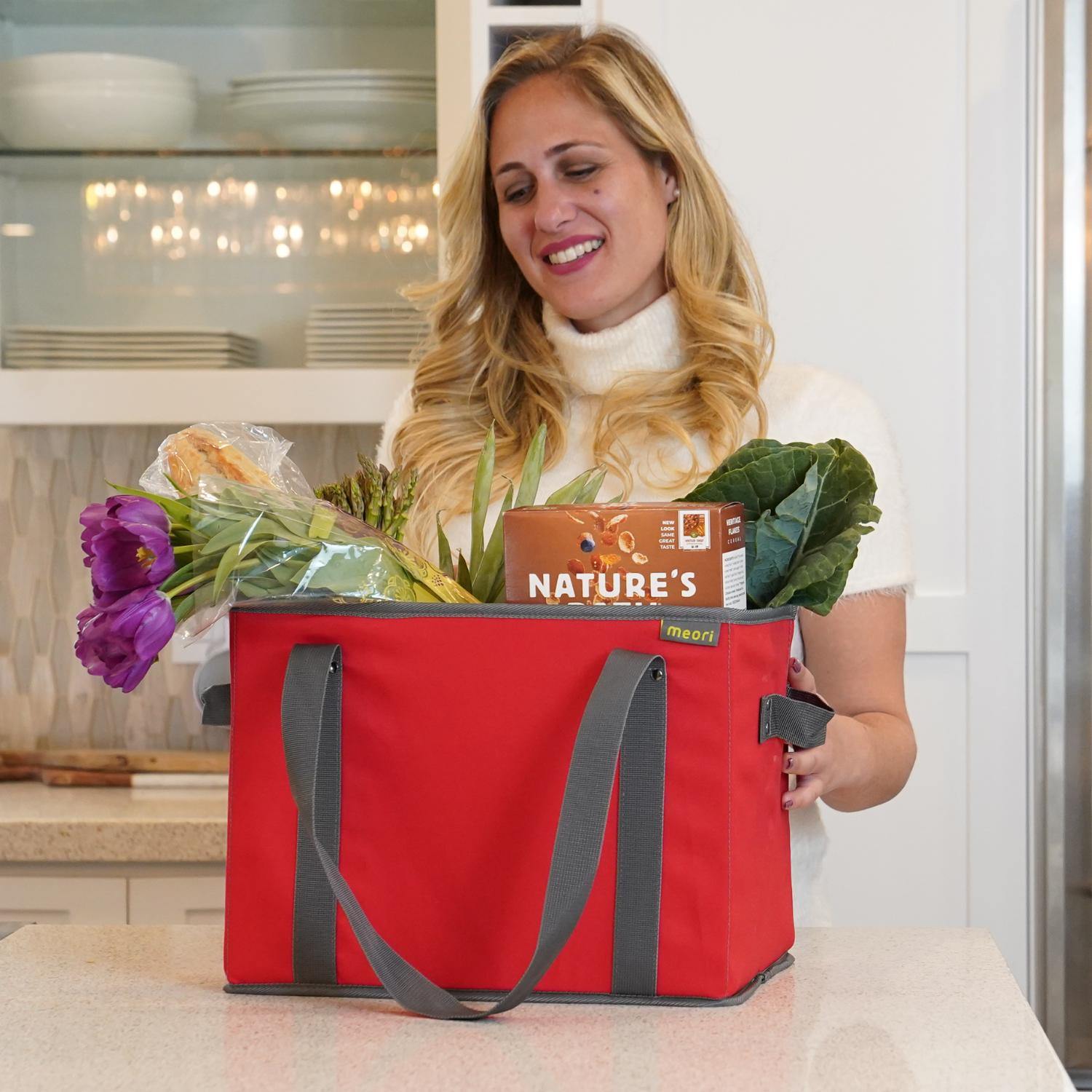 Red Collapsible Shopping Basket filled with groceries on kitchen counter