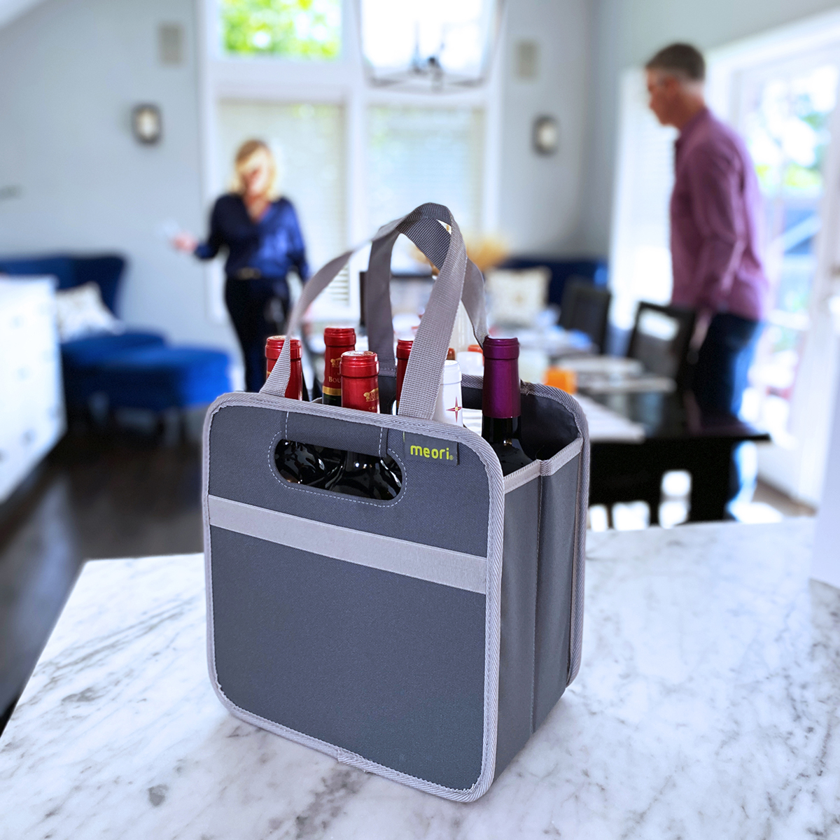 Grey 6 Bottle Wine Tote filled with 6 bottles on kitchen counter