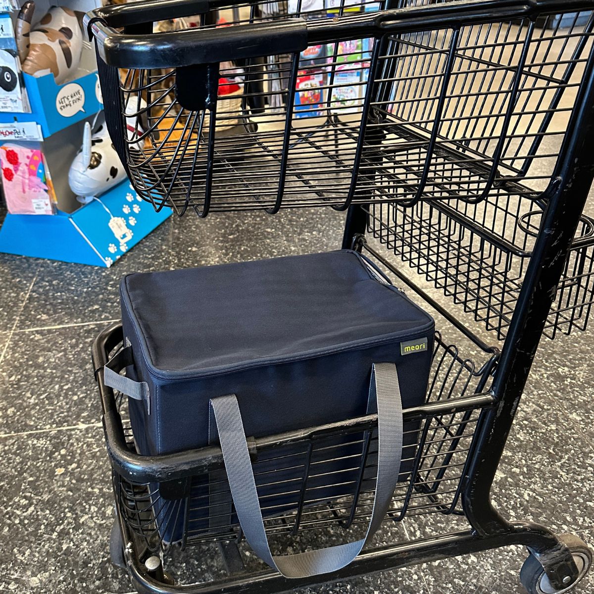 Marine Blue Insulated Grocery Bag With Zipper shown in shopping cart