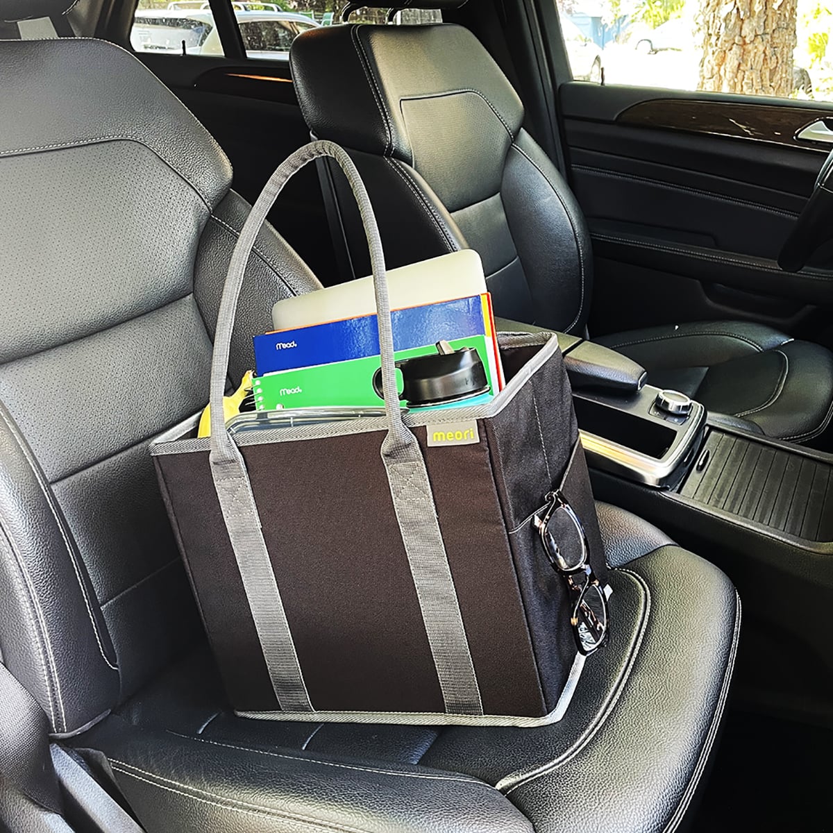 A100852-06-meori-Office-Tote-Lava-Black-LST Black Office Tote Bag with work files and lunch on passenger-side car seat