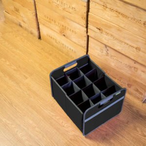 Empty Black 12 Bottle Wine Carry Bag sitting on the floor in front of wine crates