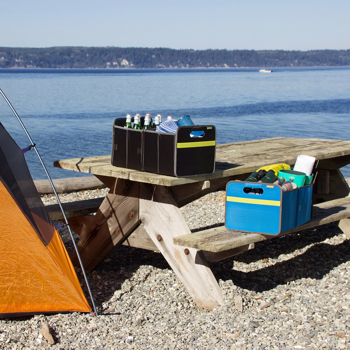 B100810-06-meori-Premium-Box-with-Party-Bowl-Med-Blue-LST Blue and Black SUV Trunk Organizers filled with camping gear on picknic table at the beach