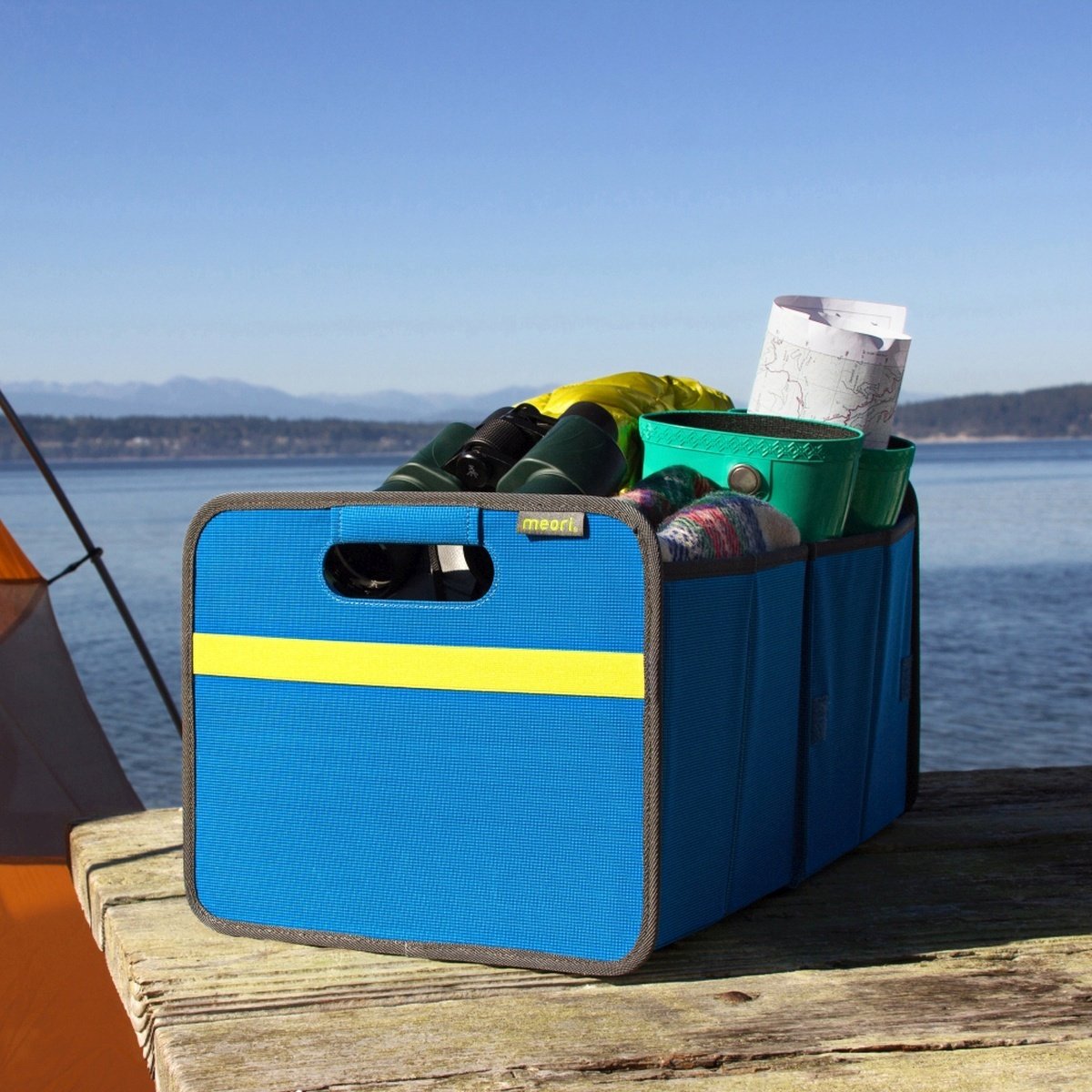B100810-07-meori-Premium-Box-with-Party-Bowl-Med-Blue-LST Blue SUV Trunk Organizer filled with camping gear on picknic table at the beach