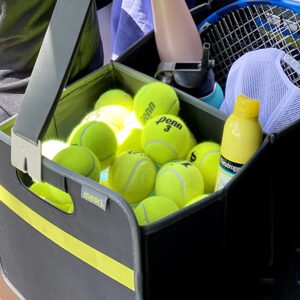 Black Trunk Organizer filled with tennis balls , water bottle and tennis racket